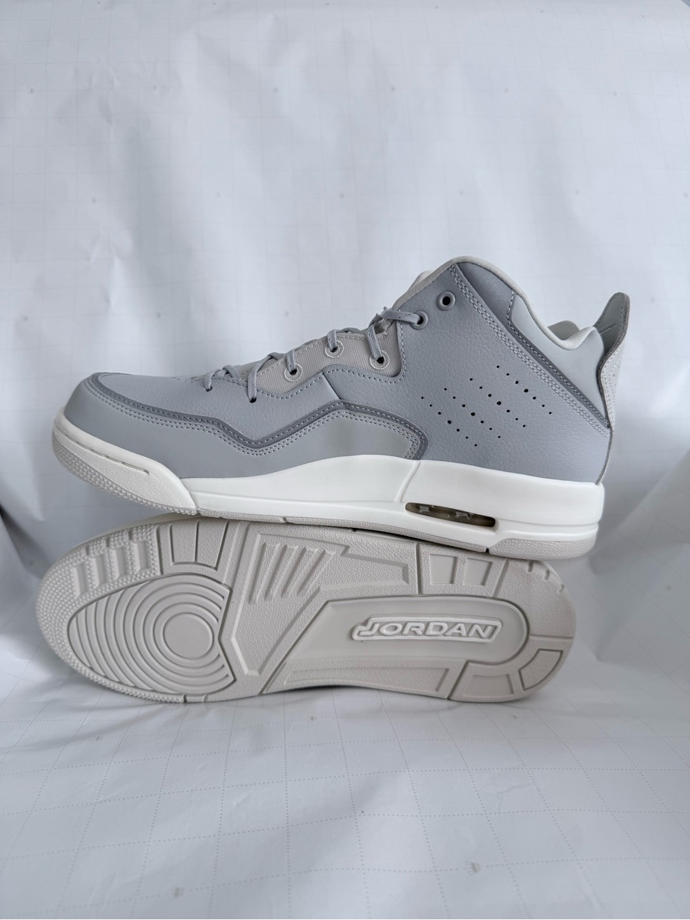 Jordan Men’s Mid-Top Sneakers in Light Gray and White